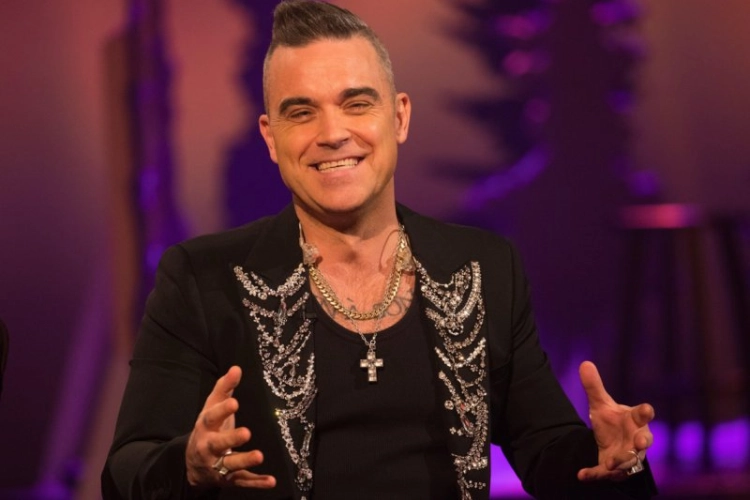 Robbie Williams haalt fel uit: “Die zangeressen worden gewoon misbruikt”